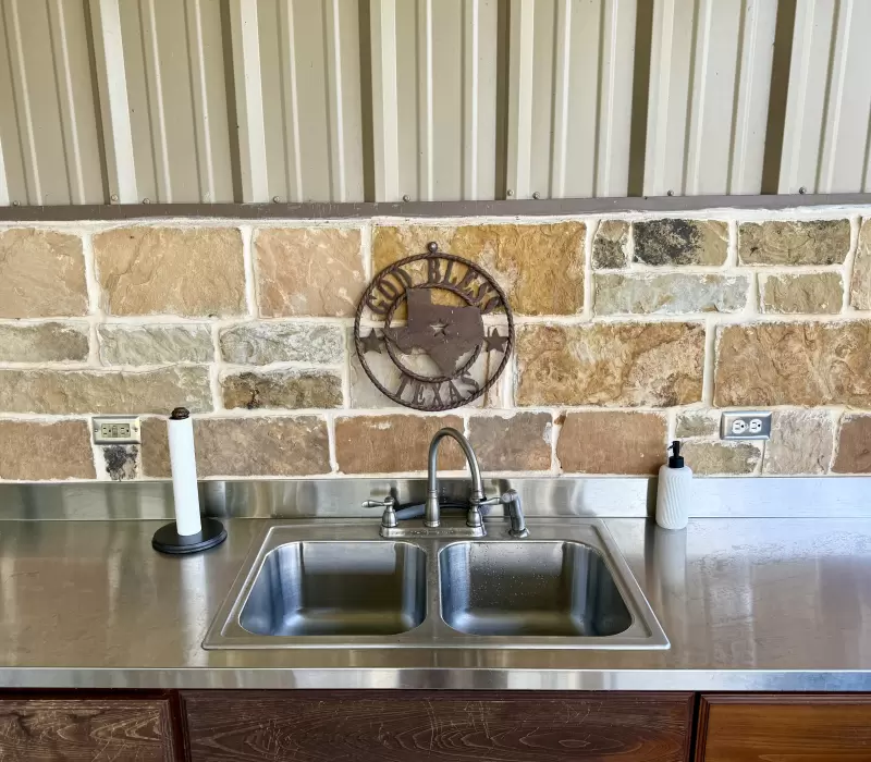 Outdoor kitchen under the covered porch